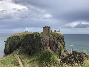 A very old castle in stonehaven at the coast of scottland