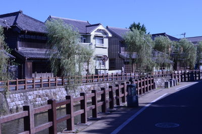 Street amidst buildings against sky