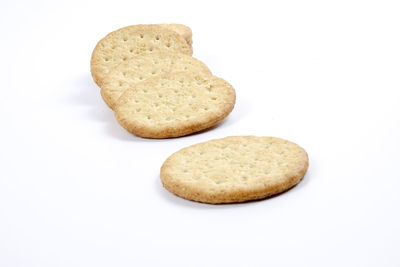 Close-up of cookies against white background