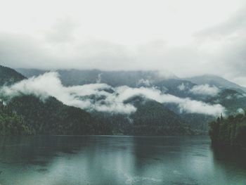 Scenic view of sea against cloudy sky