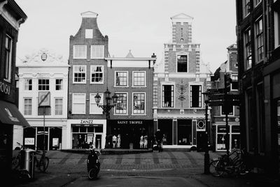 Street in city against sky