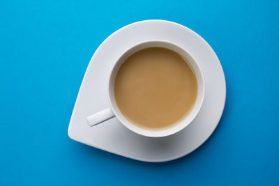 High angle view of coffee cup on table