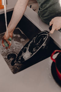 High angle view of man working on plate