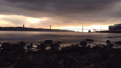 Scenic view of sea against cloudy sky