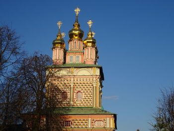 Low angle view of building against blue sky
