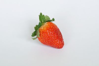 Close-up of strawberry against white background