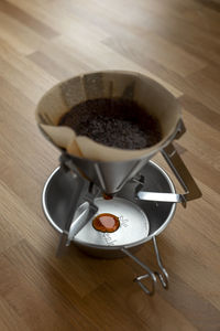 High angle view of coffee cup on table