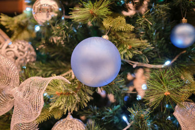 Selective focus of beautiful ornaments decorated at the christmas tree