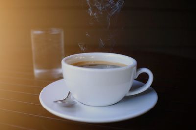 Close-up of coffee cup on table