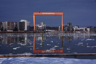 View of city buildings by river