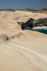 Scenic view of desert against sky