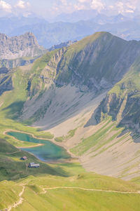 Pure turquoise water lake in the swiss alps near brienz.