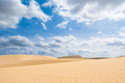 Scenic view of desert against sky