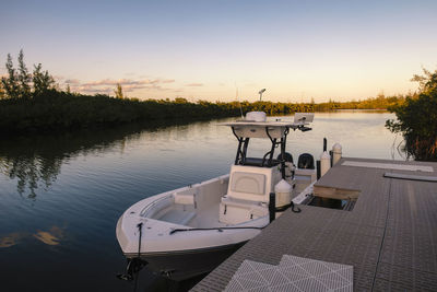 A small boat moored in a quiet corner of south bimini, bahamas