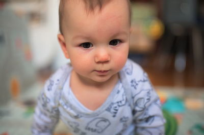 Portrait of cute little baby playing