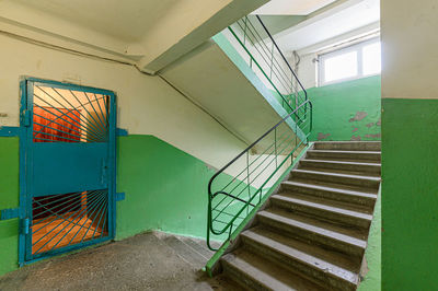 Low angle view of spiral staircase in building