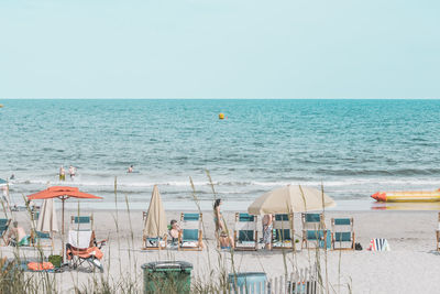 Scenic view of beach against clear sky