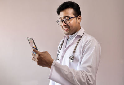 Young man using mobile phone