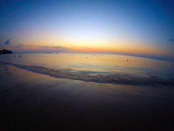 Scenic view of sea at sunset