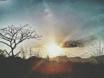 Scenic view of landscape against sky during sunset