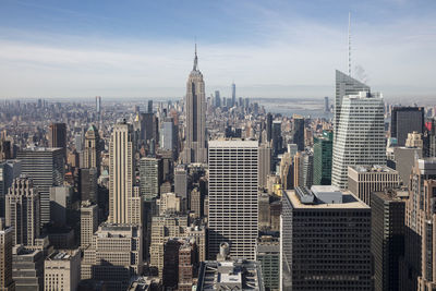 Empire state building amidst cityscape