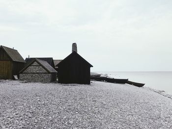 Houses by sea at beach