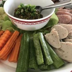 High angle view of vegetables in plate on table