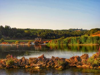 Scenic view of lake against clear sky