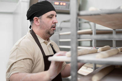 Baker preparing food at bakery