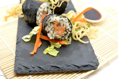 Close-up of sushi served on table