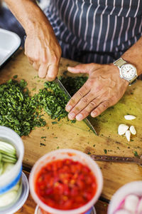 Midsection of man preparing food