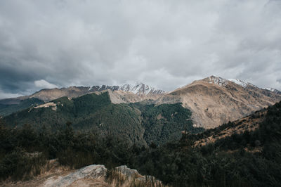 Panoramic view of queenstown hills and lake pukaki.