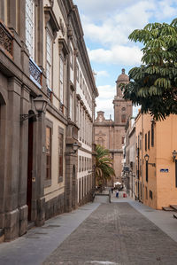 Street amidst buildings in city