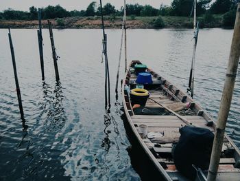 High angle view of fishing boat moored on lake