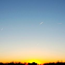 Low angle view of vapor trails in sky