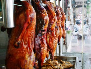 Close-up of meat on barbecue grill