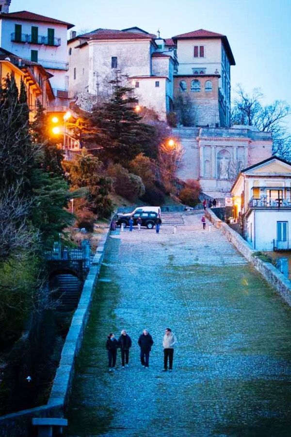 VIEW OF ILLUMINATED BUILDINGS IN THE BACKGROUND