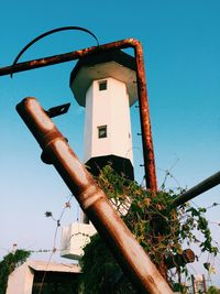 Low angle view of built structure against blue sky