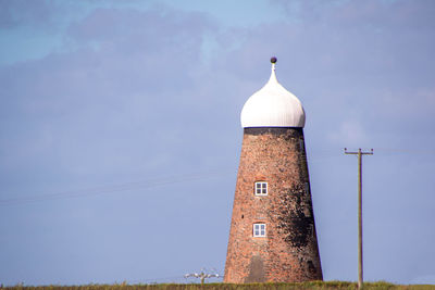 Low angle view of lighthouse against sky