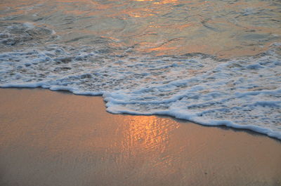 High angle view of surf on beach