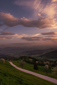 Scenic view of landscape against sky during sunset