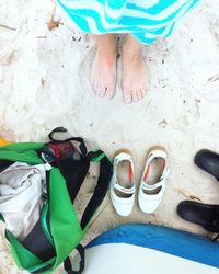 Low section of boy standing on ground