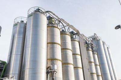 Low angle view of silo against clear sky