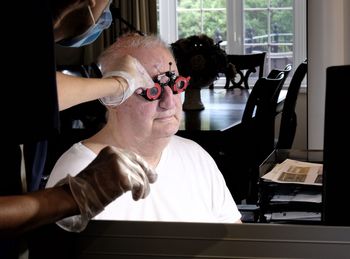 Man sitting on table at home