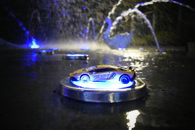 Close-up of illuminated light bulbs in water