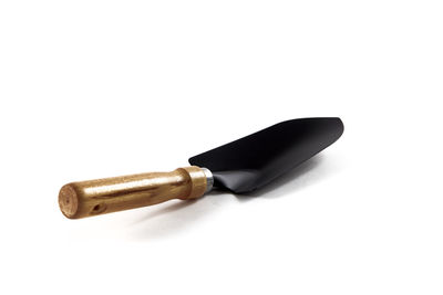 Close-up of machine part against white background