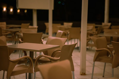 Empty chairs in cafe