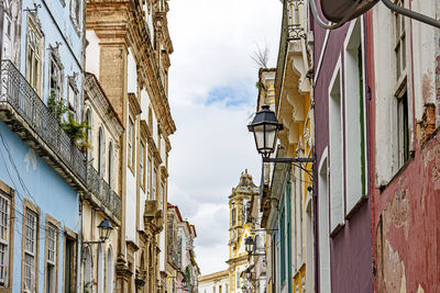 Old street and aged houses facades in historic pelourinho district in salvador, bahia