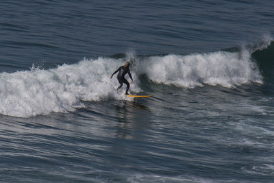 Man surfing in sea