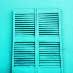Close-up of blue closed window